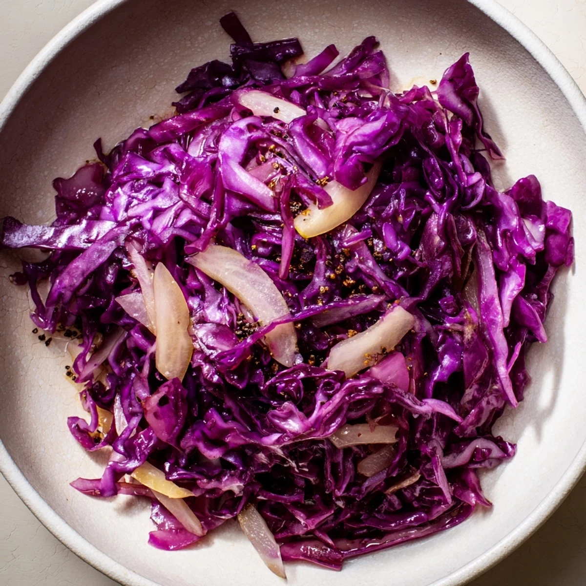 Close-up of tender, glistening Bavarian red cabbage and apple, a classic side for any meal.