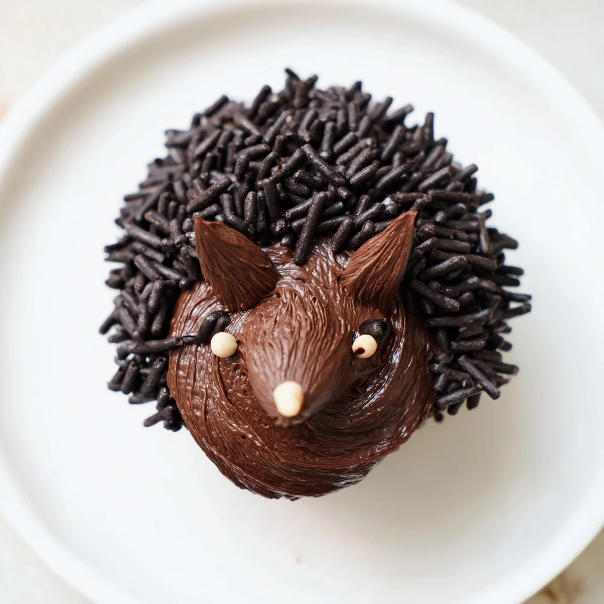 Imagine a close-up of the whimsical Hedgehog Cupcake Tower, each cupcake covered in sprinkles and details.