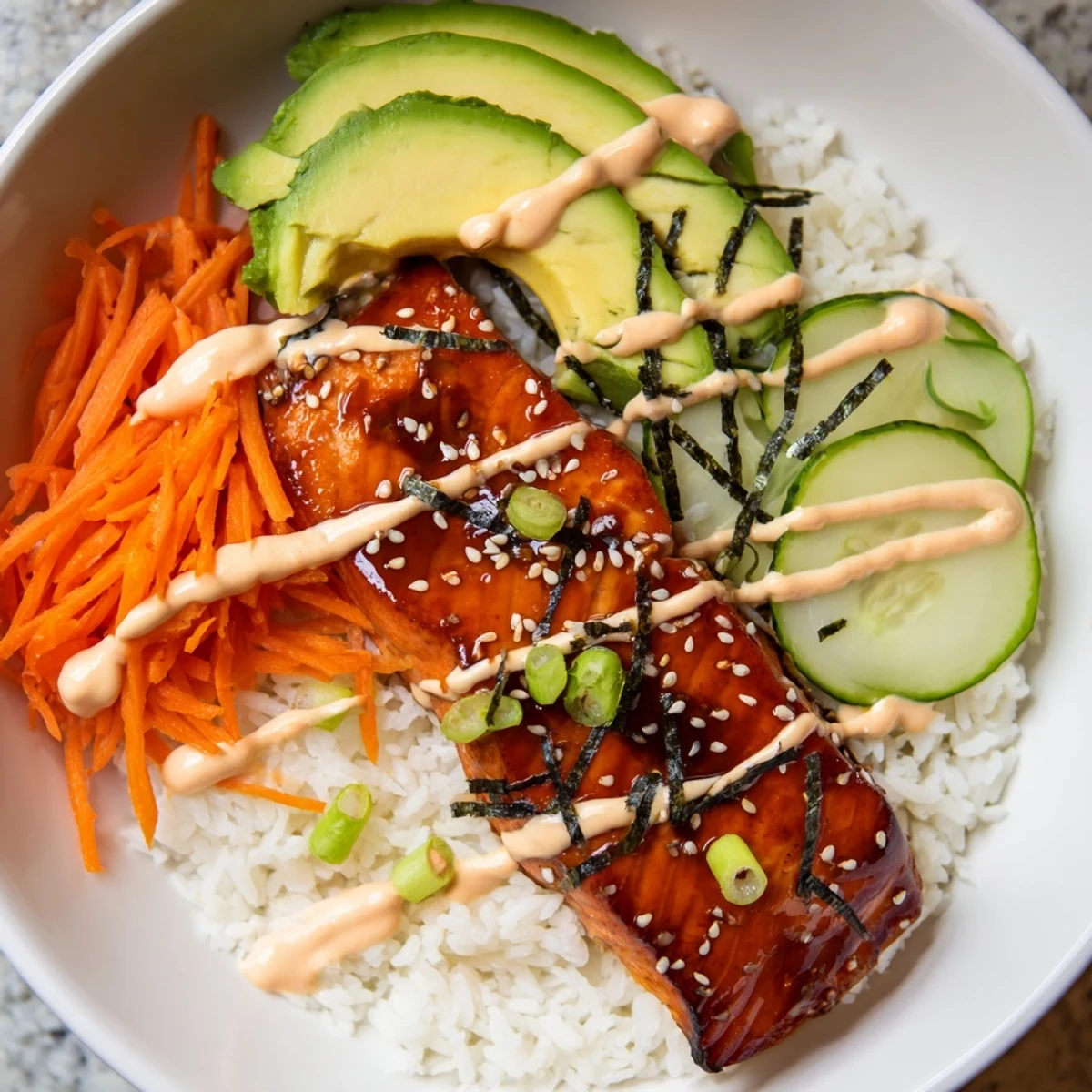 A gorgeous teriyaki salmon rice bowl, glistening with a rich glaze alongside fresh, colorful toppings.