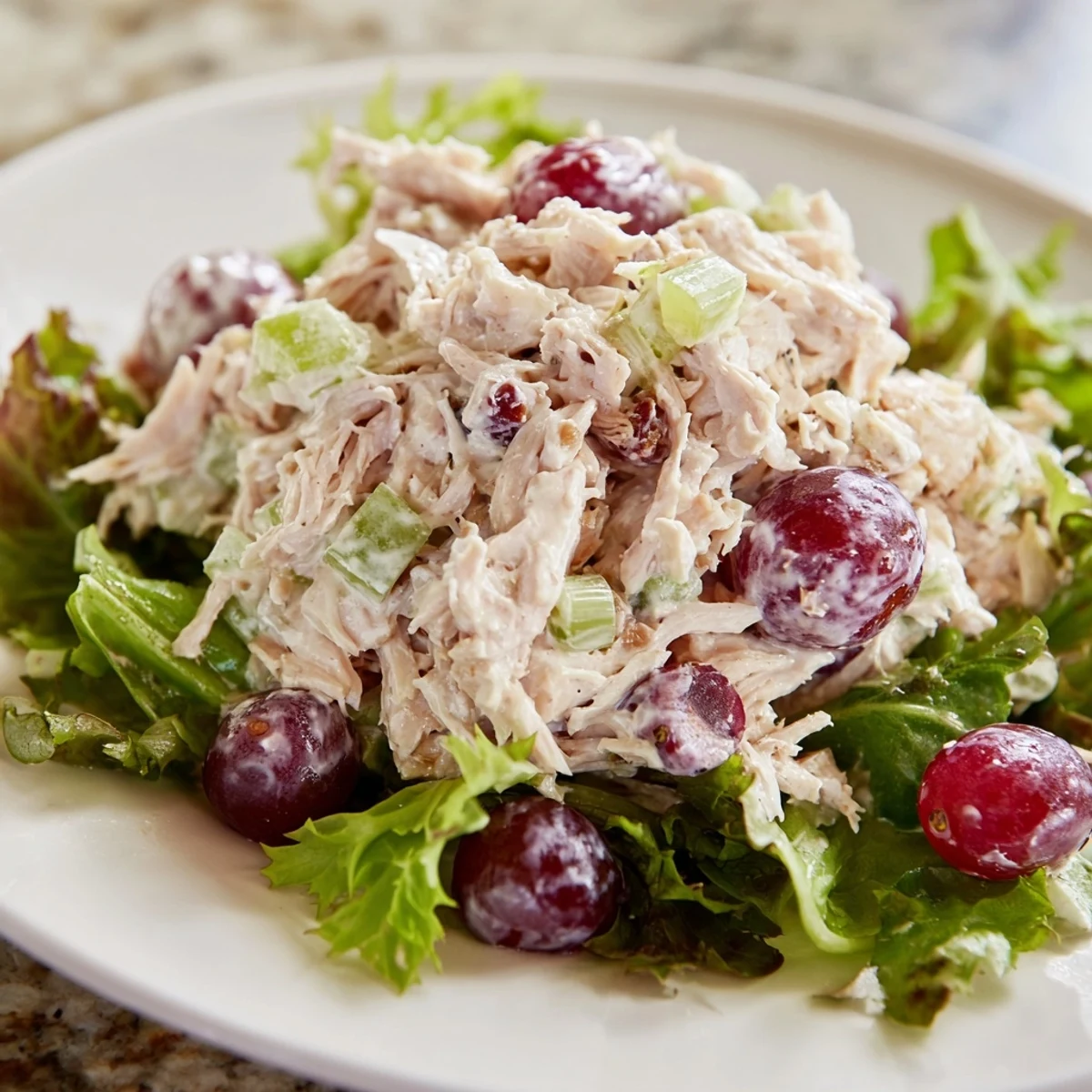 Creamy Crispy Chicken Salad with juicy grapes, crisp celery, and tender chicken piled high.