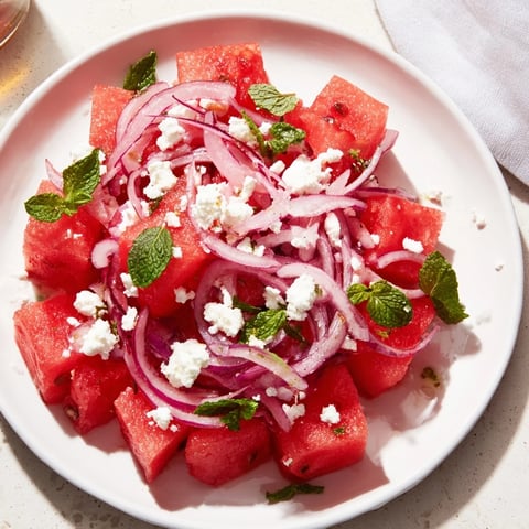 Fresh and vibrant Watermelon Feta Salad, perfect summer dish, with juicy watermelon and crumbled feta.