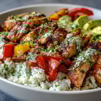 Vibrant Skinny Chicken Fajita Meal Prep Bowls with colorful peppers and cilantro-lime rice.  