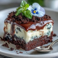 Mother's Day Flower Pot Brownies with Oreo dirt, whimsically decorated like a garden.